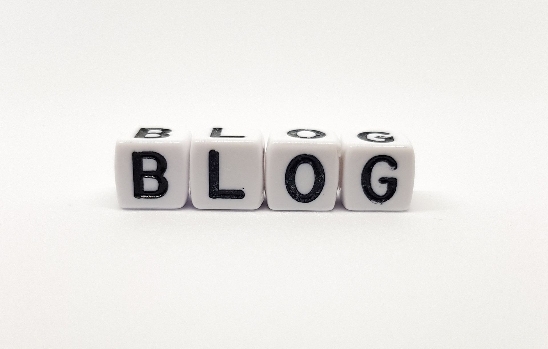 blog word built with white cubes and black letters on white background